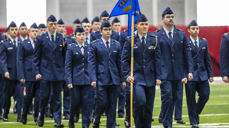 Air Force ROTC cadets march during the review.