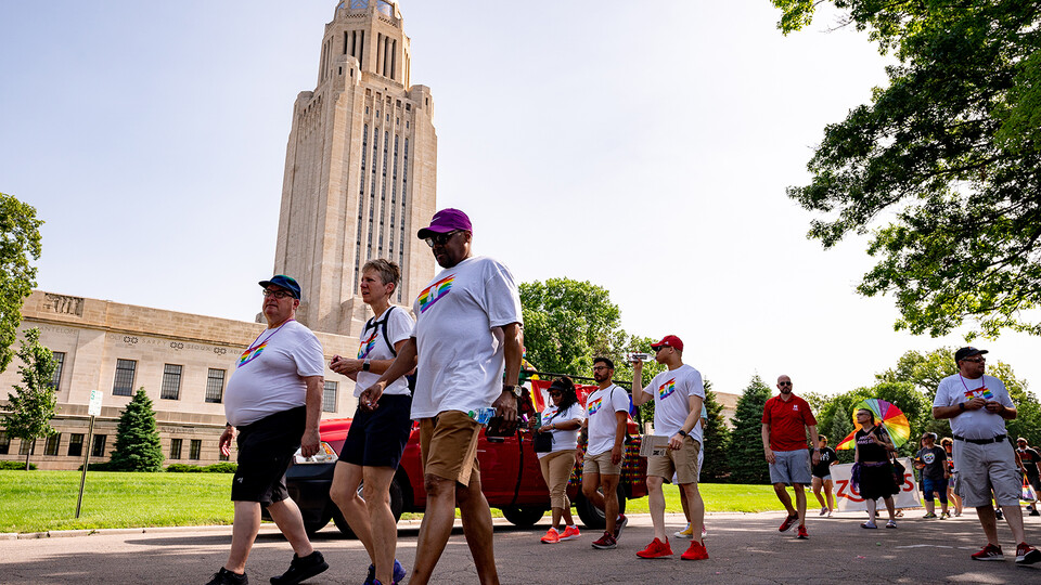 University of Nebraska representatives walk around the State Capitol during the Star City Pride parade on June 18.