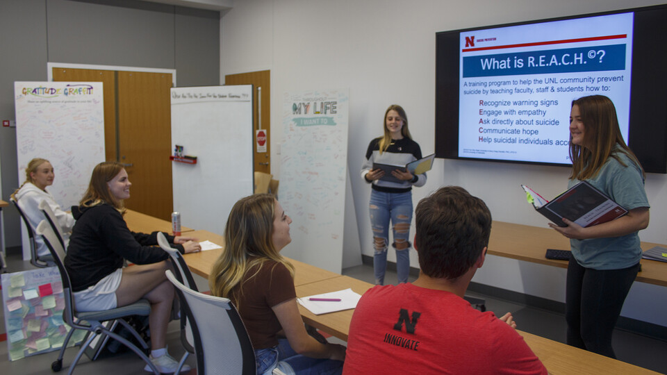 Members of the campus community complete a REACH Suicide Prevention Training session on Sept. 27 in a university classroom.