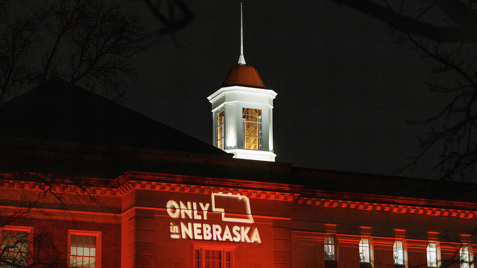 Love Library glows red as part of the university's annual Charter Day celebration. The anniversary observance includes the annual Glow Big Red giving campaign.