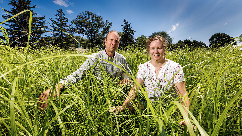 Brad Kindler and Sarah Buckley are part of projects to install native plants around the state through the Nebraska Statewide Arboretum. They stand in the east campus prairie surrounded by little bluestem and switchgrass.