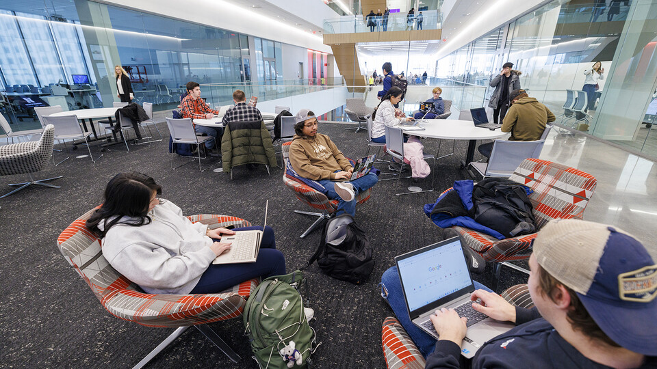 Students sit in the second-floor study areas Monday morning awaiting their first classes.