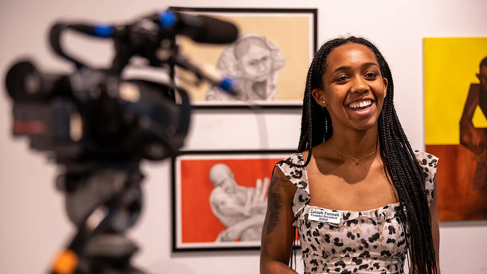 Nebraska's Zainab-Marie Funnah talks to the camera during an event in Sheldon Museum of Art.