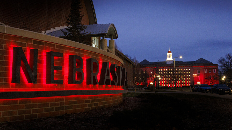The University of Nebraska–Lincolns sign outside the Van Brunt Visitors Center glows red during the 24-hour fundraiser on Feb. 14-15.