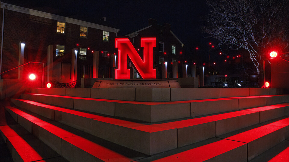 The "N" sculpture at the Nebraska Alumni Association glows red during the NU Foundation fundraiser.