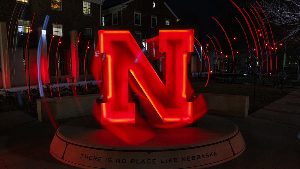 The "N" sculpture at the Nebraska Alumni Association glows red during the NU Foundation fundraiser.