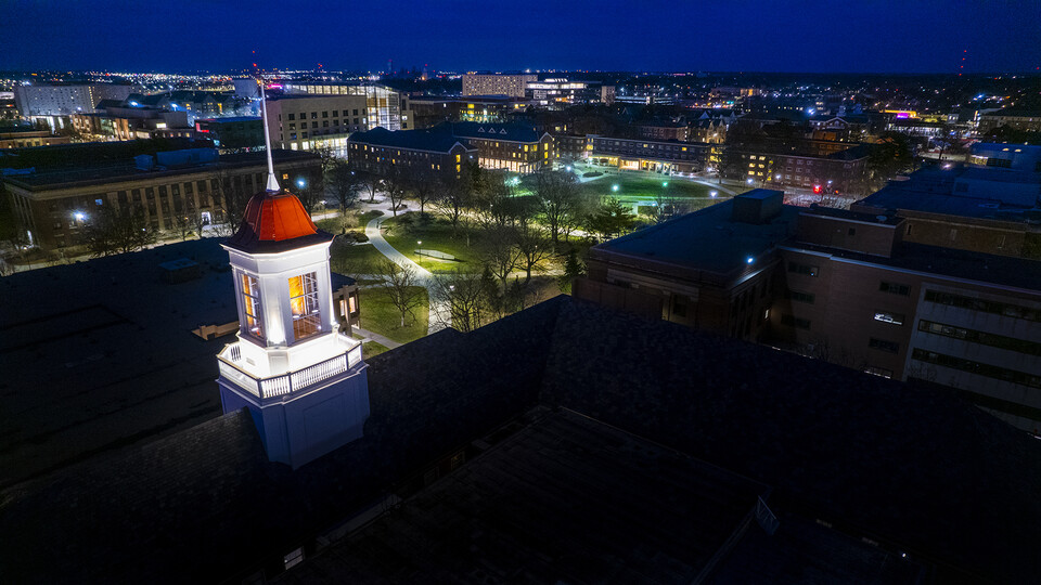 The Love Library cupola shines oer campus during the Glow Big Red event on Feb. 14.