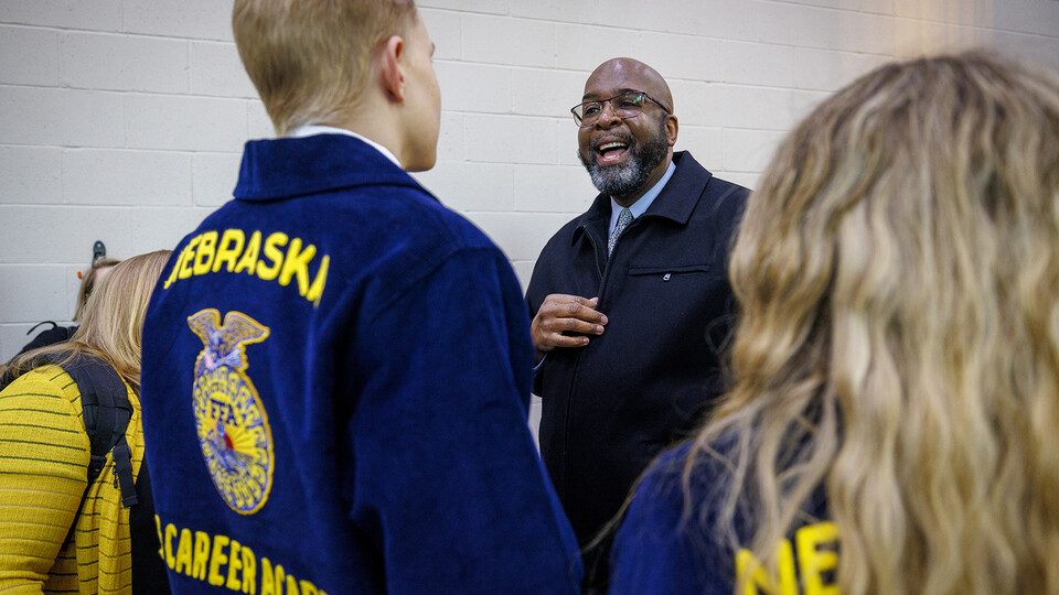 Chancellor Rodney D. Bennett talks with Austin Kamm, a senior at Lincoln Southwest High School and an incoming University of Nebraska–Lincoln student, prior to the Ag Week proclamation at Nebraska Innovation Campus.