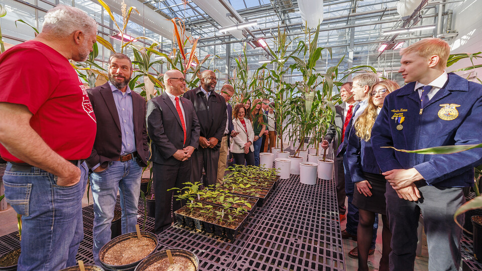 Gov. Jim Pillen, at right, and others tour Nebraska Innovation Greenhouse following the Ag Week proclamation.