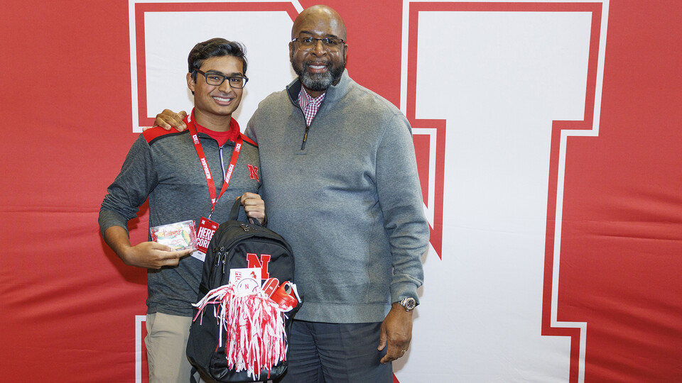 Chancellor Rodney D. Bennett poses for a photo with Shrey Agarwal during a spring semester visit. Agarwal is Nebraska U's latest Presidential Scholarship recipient.