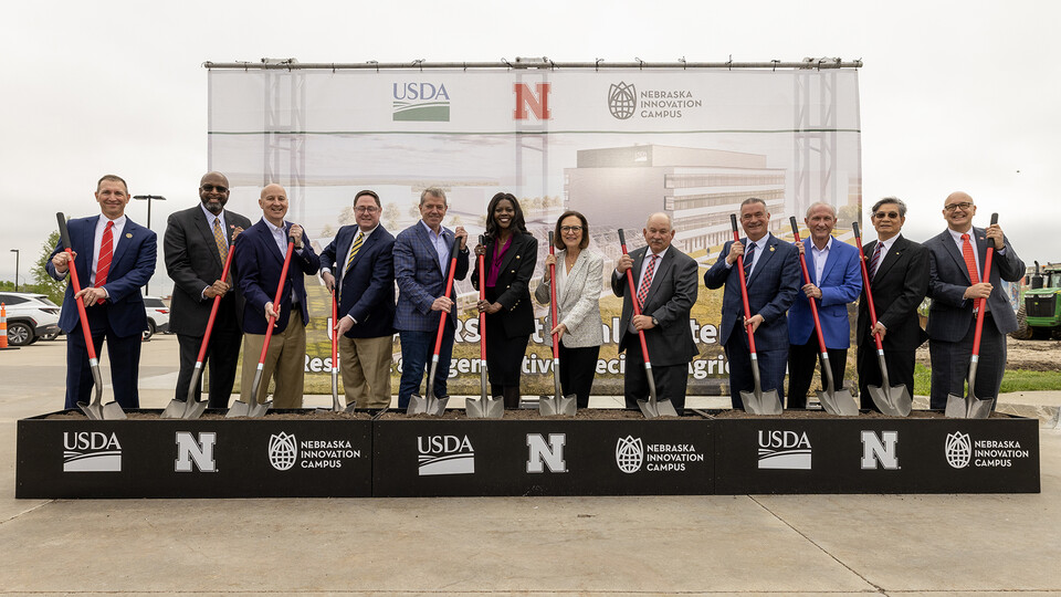 Federal, state and university leaders stand with shovels in hand at the USDA's National Center for Resilient and Regenerative Precision Agriculture groundbreaking, which was May 6 at Nebraska Innovation Campus. 
