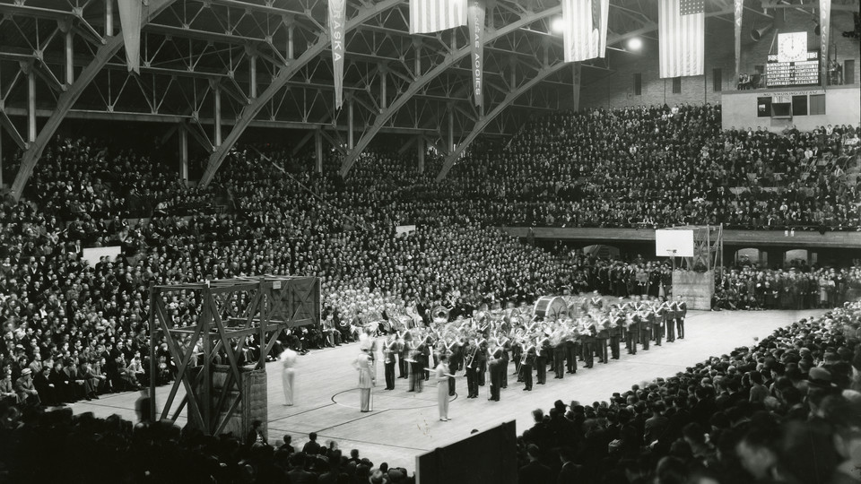 Some 7,000 fans packed the Coliseum to watch a 1936 basketball battle between the Huskers and visiting Kansas Jayhawks. The game, played in the Coliseum, was a battle for the Big Six Conference championship.