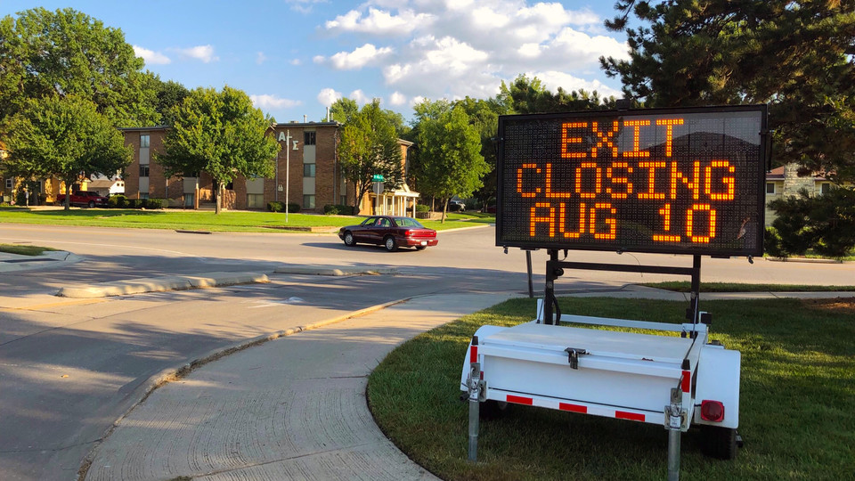 A car makes a left turn out of the right turn only lane at the intersection of 40th and Holdrege streets on East Campus. The exit lane at the intersection is closed due to safety concerns.