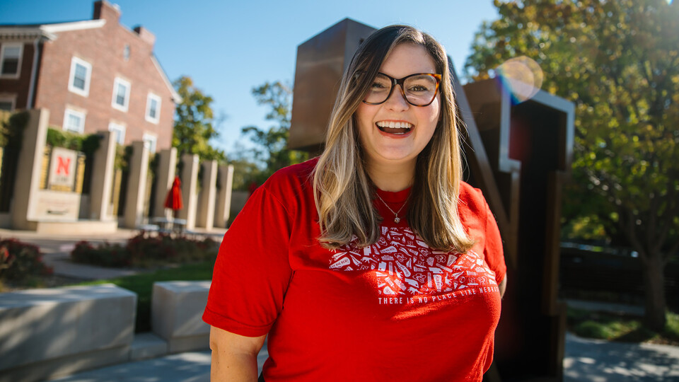 Grace Puccio is photographed in front of the Alumni Center.