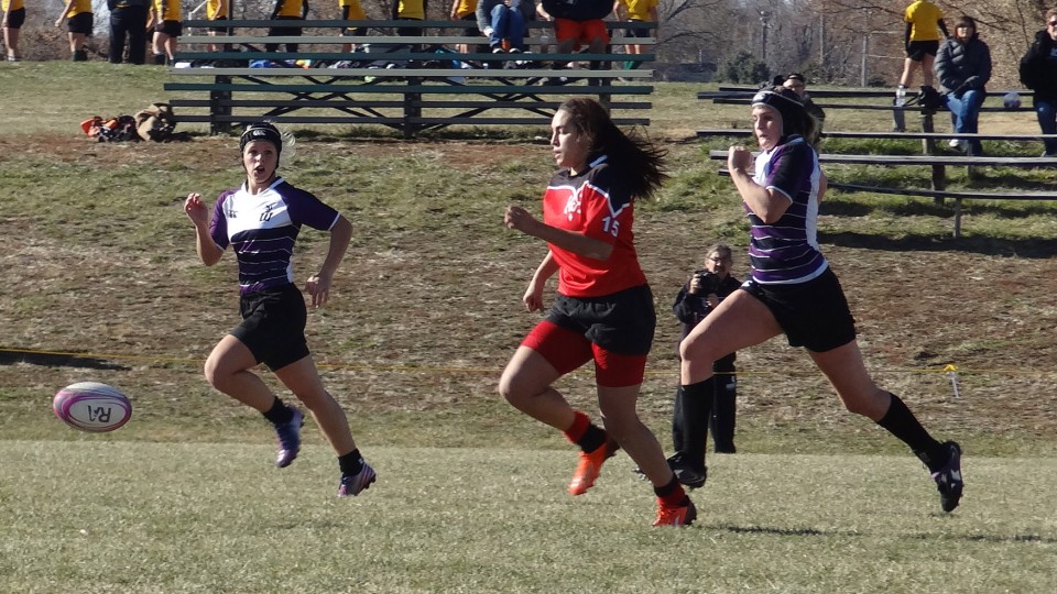 Bianca Bradley-Rael, a back on the UNL Women's Rugby team, pursues the ball during a game. Bradley-Rael is the first UNL player to be named an All-American.