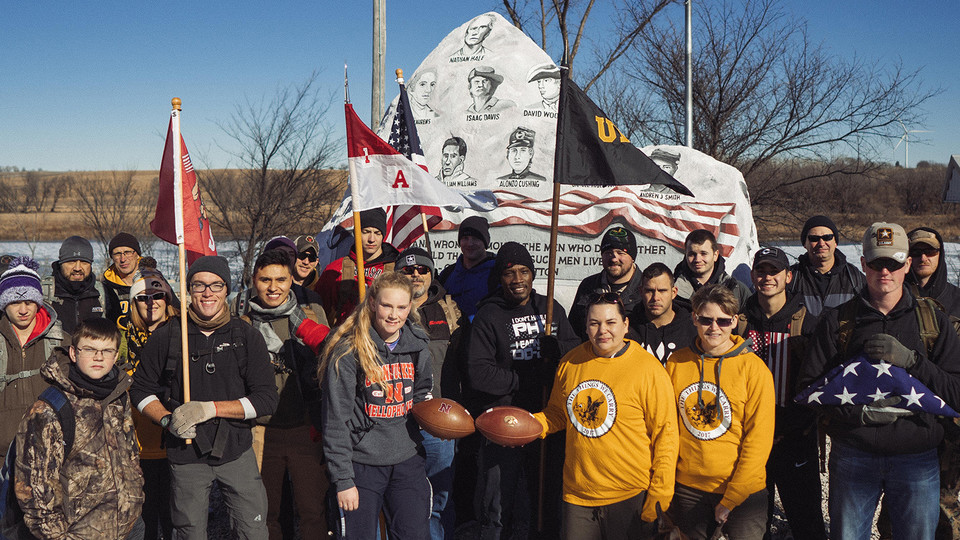 Husker and Hawkeye student veterans meet at Freedom Rock in Iowa, the halfway point in the 2018 Things They Carry Ruck March, on Nov. 18. The march ends Nov. 23 at Kinnick Stadium in Iowa City.
