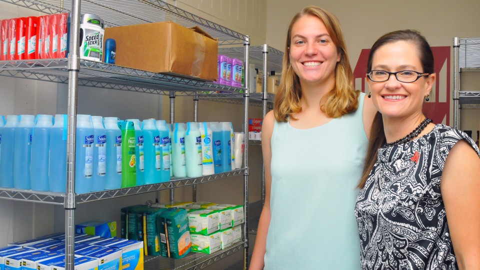 Leadership from Megan Rudolph (left) and Kelli Smith led to the creation of OpeN Shelf, a pantry that offers hygiene items and non-perishable food to students in need.