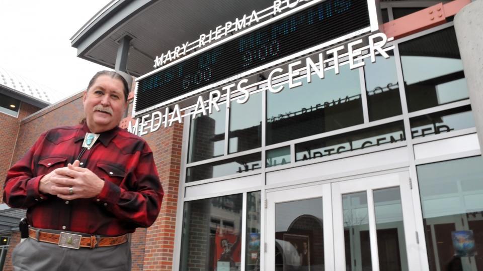 Danny Ladely, director of the Mary Riepma Ross Media Arts Center, stands outside the campus theater. The Ross has received a $7.7 million donation from the estate of Mary Riepma Ross. The gift creates a permanent endowment for the theater.