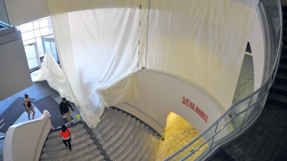 Plastic sheets block the east side of the Nebraska Union's north entrance on May 26. The plastic coupled with an air exchange system keep dust to a minimum as flooring is being removed as part of an expanded renovation in the building.