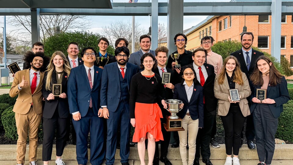 Debate members who competed at the national tournament are (front, from left) Andre Swai, assistant coach, Britton Teply, Loc Nguyen, Arjun Rishi, Juliana Quartrocchi, Nevin Butler, Jacob Wolfe, Chloe Ong, Jack Burchess, Serena Schadl, Elena Belashchenko, (back, from left) Jack Britten, Assistant coach Zach Thornhill, Grant McKeever, Caleb Alexander, Wallenburg, Joel Henson, and coach Justin Kirk. 