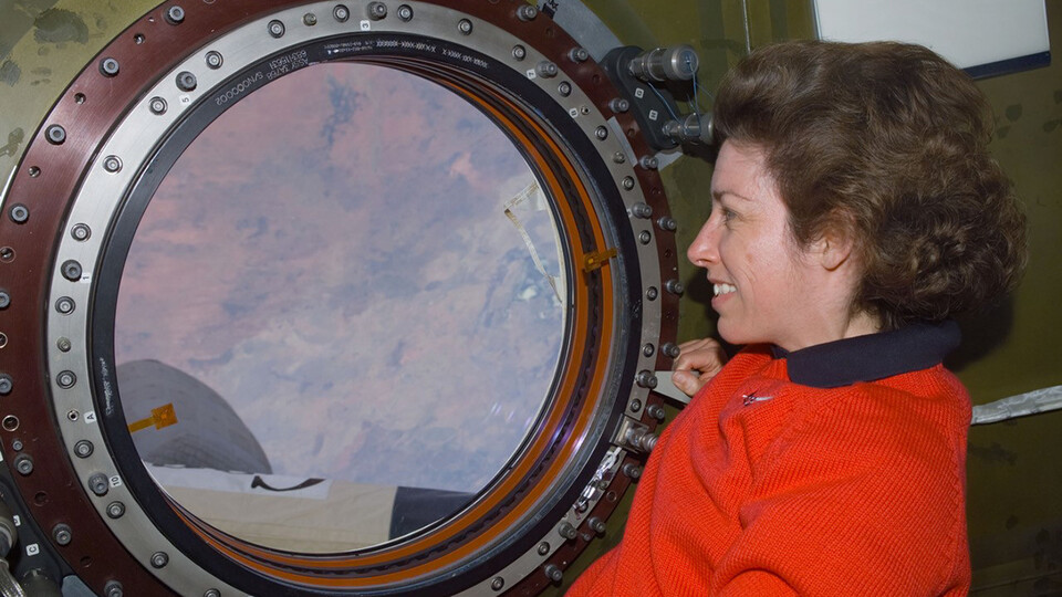 Ellen Ochoa looks out a window during her time on the International Space Station. Ochoa was the featured lecturer during the university's Women in Research Day.