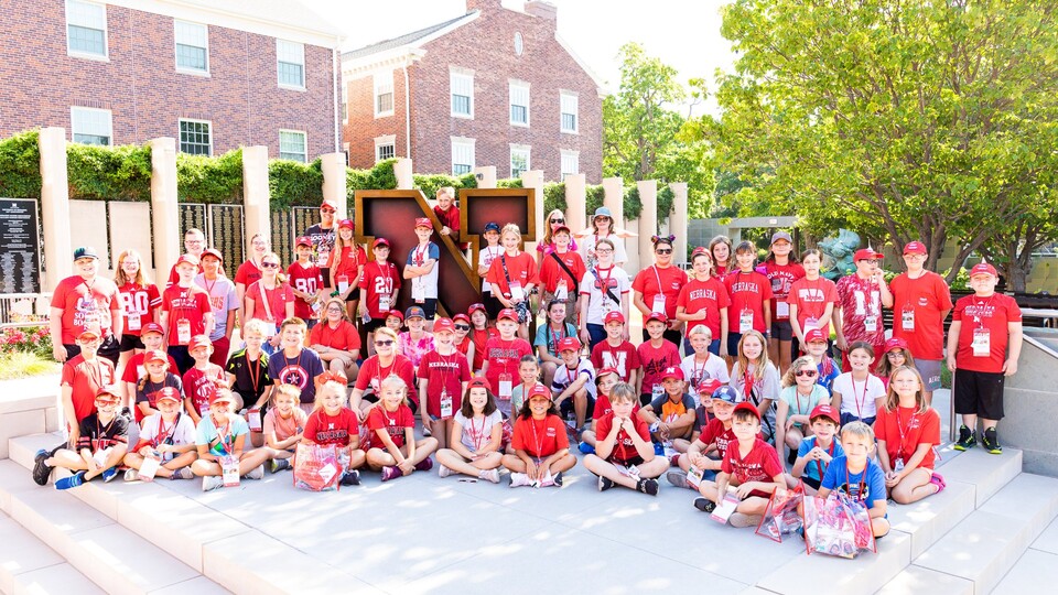 Campers attending Future Husker University in 2022 pose for a group photo.
