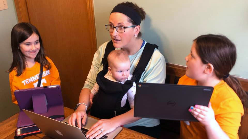 Danni Gilbert, associate professor of practice in music, works from her kitchen table while balancing parenting and teaching duties for her three children. Gilbert, a second-year campus instructor, is the first winner of Nebraska Today's Husker Home Office of the Week award.