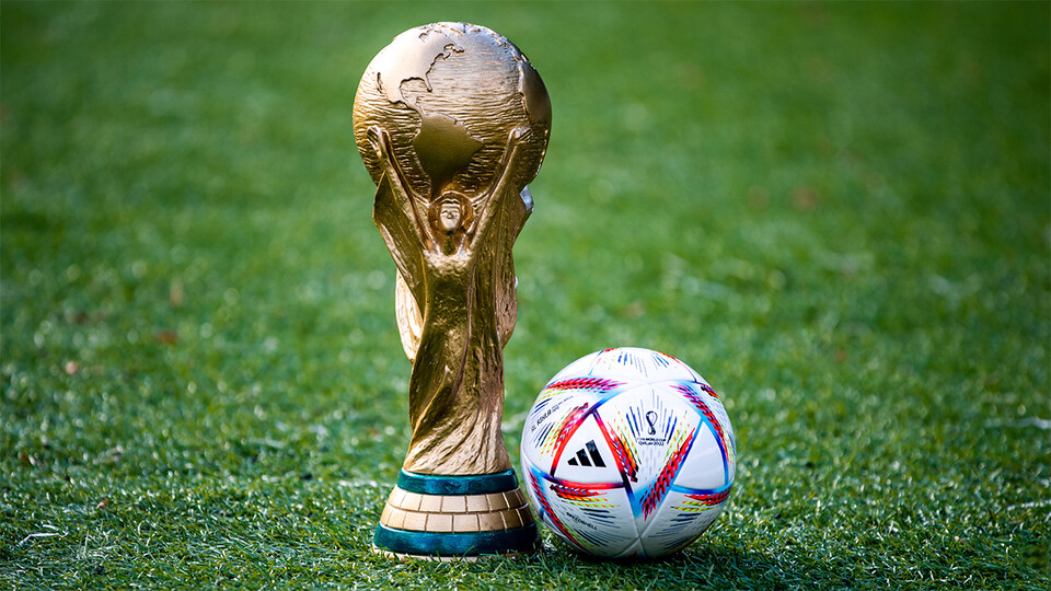 World Cup trophy with soccer ball