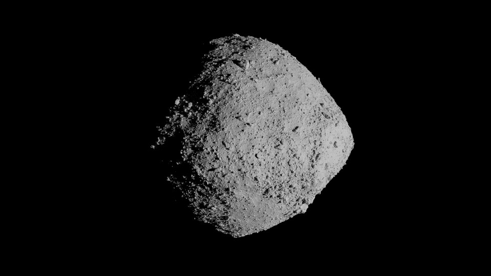 Photographic composite of a partially shadowed asteroid known as Bennu