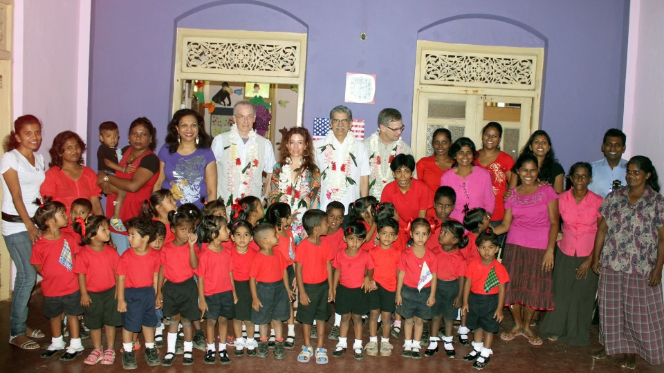 A UNL delegation poses with youth who are being helped by Syriani Tidball’s non-government organization in Colombo, Sri Lanka. The delegation visited Sri Lanka and India in January 2013. Tidball, an associate professor (back row, fifth from left), is one of two journalism faculty to receive Fulbright Specialist grants.