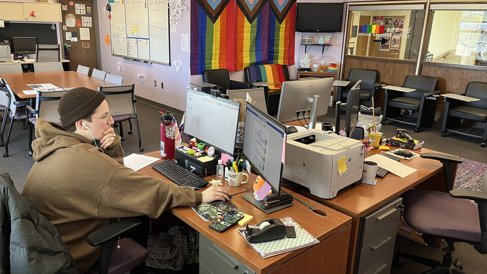 Ash Turner, graduate assistant, works in the LGBTQA+ Center Jan. 31, 2023.