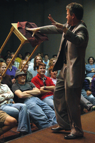 Award-winning performer Craig Karges floats a chair during a performance. Karges is featured in a free Jan. 17 performance at UNL.