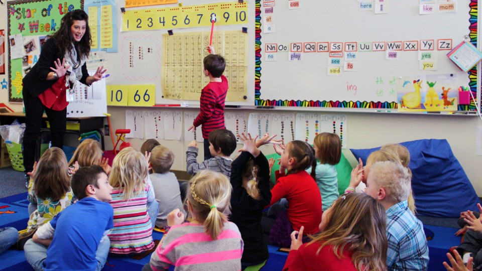 Kristy Kennedy, a Primarily Math cohort with Lincoln Public Schools, works with third graders at Kloefkorn Elementary. The UNL-based math program recently received a $537,000 grant from Women Investing in Nebraska.