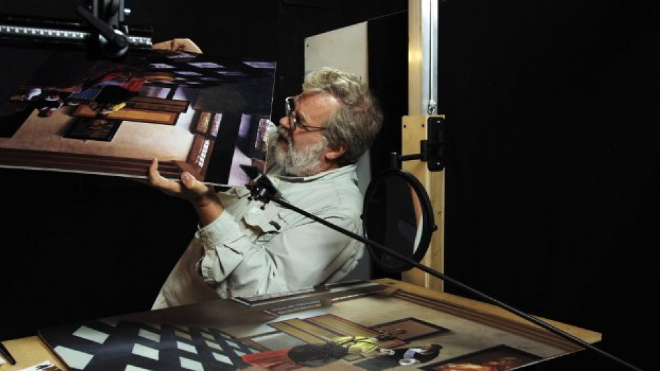 Texas-based inventor Tim Jenison examines a painting in a scene from "Tim's Vermeer," a film opening March 21 at UNL's Mary Riepma Ross Media Arts Center.