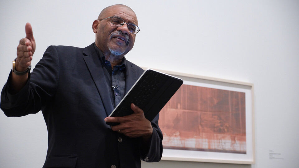 Nebraska's Kwame Dawes reads poetry in Sheldon Museum of Art. Dawes published a book, "Bob Marley: Lyrical Genius," that breaks down the multi-layered verse of the Reggae icon.