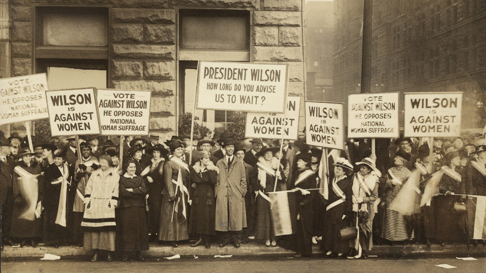 Women's suffrage supporters demonstrate against President Woodrow Wilson in Chicago on Oct. 20, 1916. Wilson withheld support for women's voting rights until 1918.