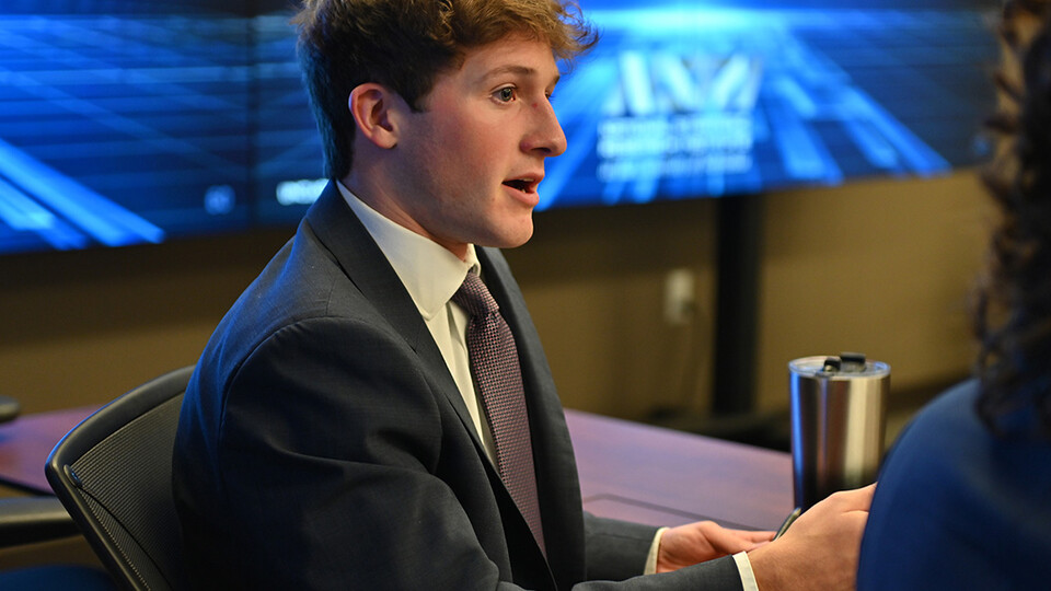 Ethan Czapla, a political science and history major at Nebraska, participates in the briefing.