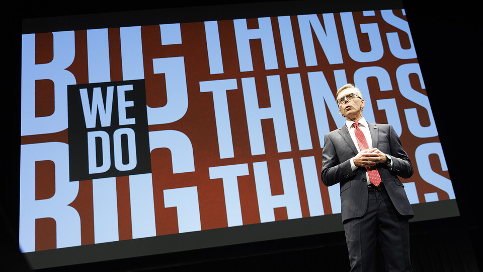 Chancellor Ronnie Green stands in front of a "Do Big Things" slide during the State of Our University address on Sept. 28 in the Lied Center for Performing Arts.