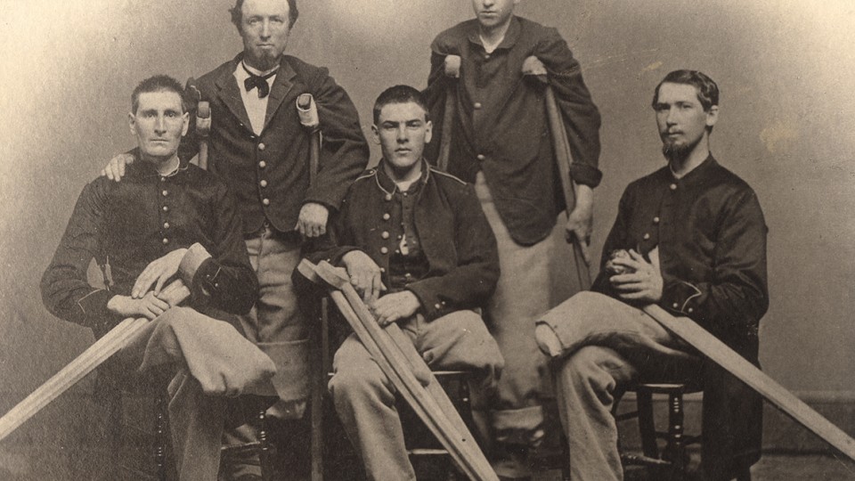 Civil War soldiers who lost limbs pose for a photo. The recovery of soldiers injured during the war is explored in the "Life and Limb: The Toll of the Civil War" exhibit, opening April 14 in Love Library.