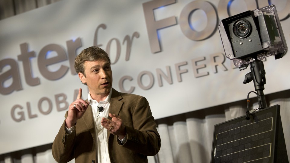 Michael Forsberg talks during the Water for Food conference in May 2013. Forsberg worked at Campus Recreation's Outdoor Adventures program when he was an undergraduate in 1987 to 1989.