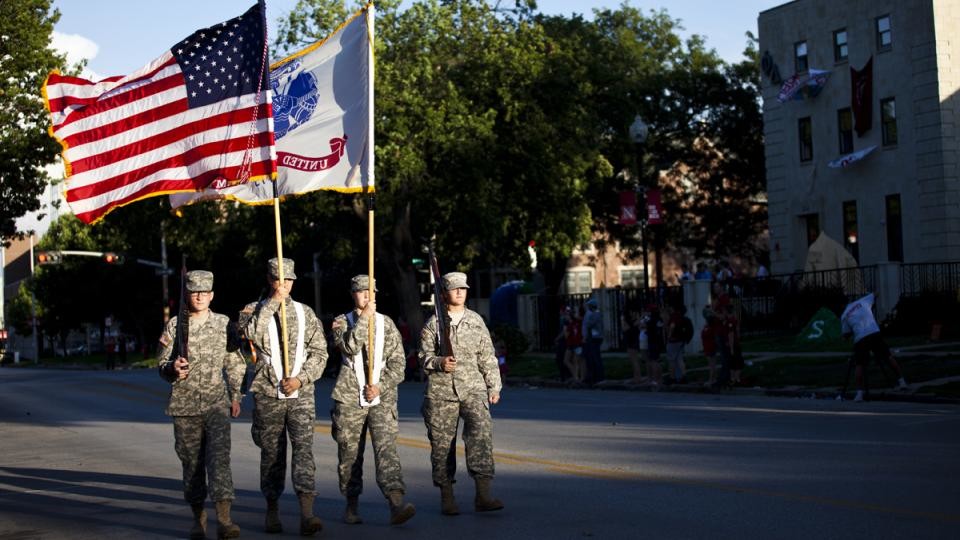 The opening of the 2013 UNL homecoming parade was led by the Army ROTC color guard.