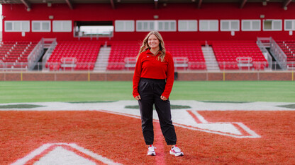 Regan Vaccaro smiles for a photo on the Hibner Stadium field.