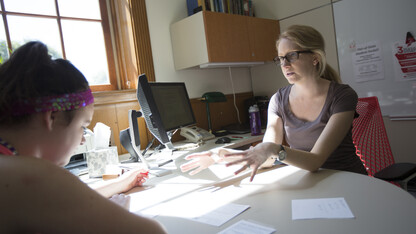 Kristin Plath (right), an adviser in the Exploratory and Pre-Professional Advising Center, meets with Natalie Mackley at the start of the fall 2013 semester. A new campus group, the Academic Advising Association, has been created to enhance student advising and expand collaboration between campus advisers.