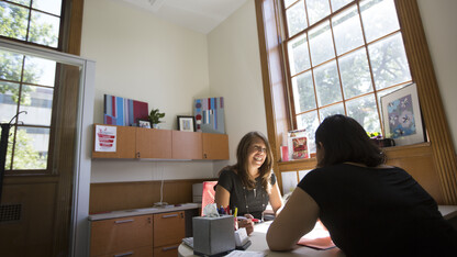 Katie Kerr, assistant director of UNL's Exploratory and Pre-Professional Advising Center, assists a student during an academic advising session at the start of the fall semester. More than 1,000 students on academic probation have participated in a new UNL program that helps chart a path toward academic success.