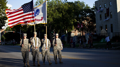 The opening of the 2013 UNL homecoming parade was led by the Army ROTC color guard.
