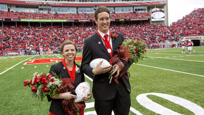 Seniors Jordyn Lechtenberg of Ainsworth (left) and Anders Olson of Tekamah were crowned king and queen of the 2013 UNL Homecoming celebration. Olson and Lechtenberg, elected in a vote of the UNL student body on Oct. 3, were crowned on the field at Memorial Stadium at halftime of the Nebraska-Illinois football game. 