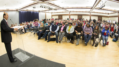 Vice Chancellor for Student Affairs Juan Franco speaks to the more than 550 students, faculty and staff who turned out for the kickoff of the "Not Here, Not Now, Not Ever" campaign. 