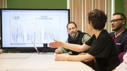 Matthew Jockers, assistant professor of English, listens to a project discussion in the Nebraska Literary Lab on March 14. Student work in the lab has resulted three presentations at the Alliance of Digital Humanities conference, which is July 7-12 in Switzerland.