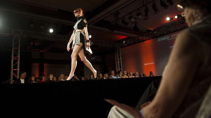 A student model walks the runway during UNL's 2014 Biennial Student Runway Show. The College of Education and Human Sciences is seeking student models for the 2016 runway show.