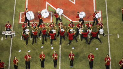 The 2014 Cornhusker Marching Band performs during UNL's Big Red Welcome festivities at Memorial Stadium on Aug. 22. The band will reveal an updated pregame and the first of eight new halftime shows during the Aug. 30 Husker football game against Florida Atlantic.